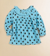 Bursting with polka dots and pleats, this cozy woven top has back buttons and long sleeves.Round neckline with pleatsLong sleevesBack buttonsCottonMachine washImported Please note: Number of buttons may vary depending on size ordered. 