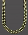 An instant style revival. Two rows of shimmering green cultured freshwater pearls (8-9 mm) add a spring-time touch to any look. Clasp crafted in sterling silver. Approximate length: 18 inches.