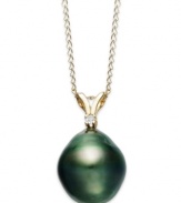 Inspired by estate jewelry, this timeless piece features a Tahitian pearl (9-10 mm), a sparkling diamond accent and a delicate 14k gold chain and setting. Approximate length: 18 inches. Approximate drop: 5/8 inch.