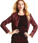 Calvin Klein's faux leather jacket is a gorgeous way to add structured edge to your ensemble--seamed details and shiny zippers make this piece especially sleek.