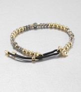 From the Brilliance Collection. A mix of silvery and golden beads includes faceted hematite, smooth gold-finished stainless steel and rhinestone-crusted spheres, strung on a stretchy strand with a leather slide close.HematiteGlassGoldtone and stainless steelLeather Diameter, about 2.25Imported