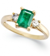 Enviable green hues. This vibrant 14k gold ring features an emerald-cut emerald (3/4 ct. t.w.) and round-cut diamond side stones (1/5 ct. t.w.).