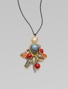 A colorful cluster of semi-precious stones with goldtone and Swarovski crystal accents on a gunmetal finished link chain. May include labradorite, carnelian and smokey quartzMay included mother-of-pearl doublet, imitation coral and Swarovski crystalsGoldtoneRuthenium platedLength, about 32Lobster clasp closurePendant size, about 2¾ Made in USAPlease note: Stones may vary. 