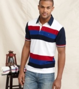 With bold and sporty color blocking, this polo shirt from Tommy Hilfiger will instantly score in your casual wardrobe.