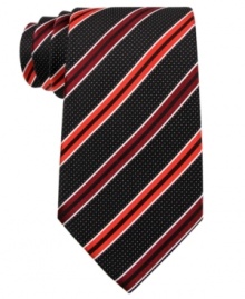 Mix work and play with multiple patterns on this silk tie from Sean John.