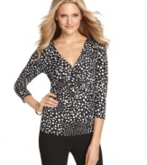 What could be prettier than polka dots?  Cable & Gauge's braided-front top puts a special twist on the trend of the season!