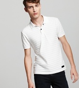 Tonal white stripes stand out with a raised texture on the Burberry Sport Wiseman polo.