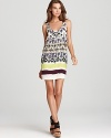 A global-inspired print enlivens this Sam & Lavi dress for vibrant sunny-season style.