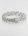 An intricately braided, sterling silver design accented with a dazzling diamond encrusted closure. Sterling silverDiamonds, .42 tcwLength, about 7.25Push clasp closureImported 