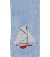 Set sail for uncharted bath decor with this nautical-themed hand towel from Creative Bath. Emblazoned with a seafaring schooner, this plush towel docks beautifully-powder rooms to bathrooms.