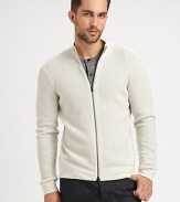 An elegant, contemporary design that layers beautifully over any soft cotton henley or woven sportshirt to keep you stylishly warm and cozy all season long; Knitted in waffle textured cashmere for longlasting style and comfort.Two-way zip frontMockneckBanded cuffs and hemCashmereDry cleanImported