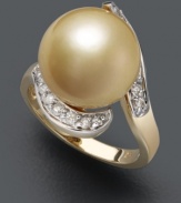 Decorate your fingers with polish and shine. This elegant ring highlights a cultured golden South Sea pearl (14 mm) in a swirling 14k gold and round-cut diamond (1/3 ct. t.w.) setting.