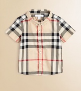 Fashioned in the renowned check design, this breezy cotton button-down features a shirttail hem and patch pocket.Button-down collarShort sleevesButton-frontFront patch pocketShirttail hemCottonMachine washImported Please note: Number of buttons may vary depending on size ordered. 