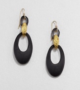 From the Lucite Collection. Sleek oval loops of hand-painted, hand-sculpted Lucite are connected by a golden bale with a rich pebble texture.LuciteGoldtoneLength, about 2.4Ear wireMade in USA