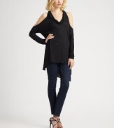 Luxe jersey knit drapes across the body in fluid, shoulder-baring silhouette.Cowlneck Open shoulders Long sleeves Asymmetrical hem Back slit About 28 from shoulder to hem Viscose Dry clean Made in USA of Italian fabric