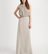 A regal design featuring a softly pleated silk top and a floor-skimming skirt.Jewel necklineSleevelessSoftly pleated topSide zipperButton back closureBack seamsSilk liningAbout 62 from shoulder to hem66% georgette/34% silk chiffonDry cleanImported Model shown is 5'10 (177cm) wearing US size 4. 