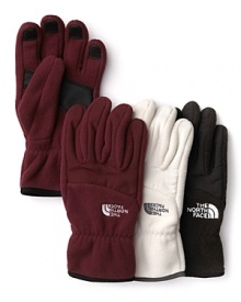 Cozy fleece ensures warmth and comfort in these essential winter gloves from The North Face®.