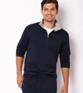 Hit the gym in style with this quarter-zip sweatshirt from Nautica.