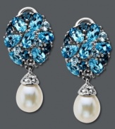 Sparkling sophistication with a hint of shimmer. Pear-cut blue topaz gemstones (4-3/8 ct. t.w.) highlight the post, while sparkling white topaz accents adorn the top of a cultured freshwater pearl (7 mm x 9 mm) in these breathtaking drop earrings. Set in sterling silver. Approximate drop: 1-1/8 inches.