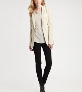 An irresistible take on the classic blazer, this sleek design features creamy leather to complement its crisp, clean lines. Leather along notched collarLong sleevesLeather trimButton closureWelt pocketsFully linedAbout 28 from shoulder to hem48% polyester/48% viscose/4% elastaneDry clean by leather specialistImported Model shown is 5'10 (177cm) wearing US size 4. 