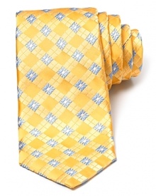 A squared floral print makes a statement on a silk tie from Ike Behar.