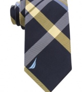 Give any solid shirt a preppy punch with this crisp plaid tie from Nautica.