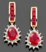 Heat up your look with sizzling style. Earrings feature pear-cut ruby (2-1/2 inches) and round-cut diamond (1/4 ct. t.w.) set in 14k gold. Approximate drop: 3/4 inch.