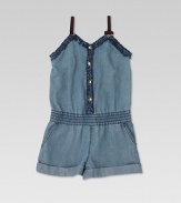 A bleached denim one-piece is given a pretty update with ruffled trim, signature web straps, bow and GG heart detail.Sweetheart necklineSleevelessFront snapsElastic waistbandCuffed hemSilk liningLyocellDry cleanMade in Italy Please note: Number of snaps may vary depending on size ordered. 