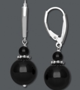 Simply refined and classically elegant, these onyx (4-10 mm) bead earrings offer just a touch of glamour to any dress, whether casual or formal. Set in brilliant sterling silver. Approximate drop: 1-1/2 inches.