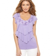 Swingy tiers of fabric and a row of fabric rosettes makes AGB's top feel feminine and just right for spring!