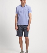 The classic summer polo is updated in cotton jersey with striped tipping along the collar and armholes.Three-button placketCottonMachine washImported