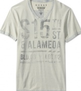 This Guess Jeans t-shirt has a vintage feel and a stylish v-neck design.