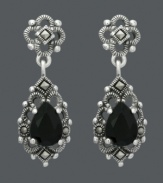 Let old world glamour inspire you. Genevieve & Grace earrings feature pear-cut onyx stones (5 mm x 7 mm) encircled by glittering marcasite in sterling silver. Approximate drop: 1 inch.