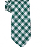 Bring classic country to the corner office with this fresh gingham skinny tie from Tommy Hilfiger.