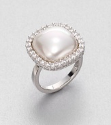 A modern look, offering a lustrous white, organic manmade mabé pearl surrounded by twinkling cubic zirconia in a beaded setting of polished sterling silver.15mm white, square organic, manmade mabé pearlCubic zirconiaSterling silverAbout 1 squareMade in Spain