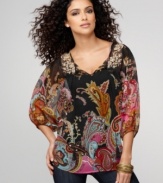 Dark beauty: a black background allows a vibrant paisley print to pop on One World's chiffon peasant top!