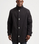 The classic car coat cut from rich tech wool and finished with distinctive gancini closures.Stand collarFront gancini closureSlash pocketsAbout 35 from shoulder to hemWoolDry cleanMade in Italy