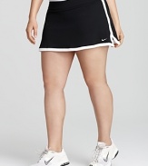 Serve a smashing hit in this retro-style Nike skirt. Built-in shorts lend comfort and coverage.