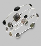 From the Scultura Collection. Five ovals of rich onyx cabochon are set in a graceful sterling silver bangle.Onyx cabochon Sterling silver Diameter, about 2¾ Imported