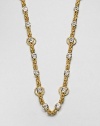 From the Striking Gold Collection. Sparking, faceted stone stations on a long, sturdy link chain. GlassGoldtoneLength, about 40Lobster clasp closureImported 