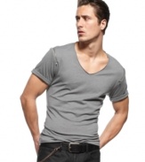 Upgrade your basic t-shirt style with this modern v-neck from INC International Concepts.