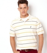 Clean and classic, this polo shirt from Nautica bridges the gap between casual and preppy style.