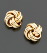 Ribbed texture and knotted detail are richly understated–and perfect for the office. Set in 18k gold. 1/2 diameter.