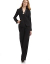 THE LOOKSatin banded collarLightly padded shouldersConcealed front button closureLong sleeves with concealed button cuffsTwo front welt pocketsPrincess seamsBack ventTHE FITAbout 24 from shoulder to hemTHE MATERIALBody: 65% triacetate/35% polyamideTrim: polyesterSilk linedCARE & ORIGINDry cleanMade in USA