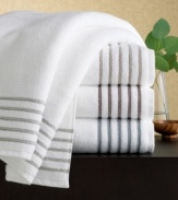 Extra plush but lightweight, this Hotel Collection hand towel is extraordinarily soft and absorbent without being overly dense. Five dobby stripes at the border add tailored detail to this luxury towel.