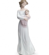 Remember these early memories forever with Lladró. A young mother holds her child with a glance of pure serenity and love. Makes the perfect gift for any mother.