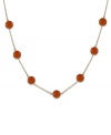 A few carnelian gems (10 mm) collect across a 14k gold chain to create the perfect necklace to add a little pop of color to your wardrobe. Approximate length: 16 inches.