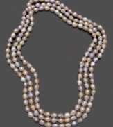 Soft pink and peach tones add subtle accent to this beautiful cultured freshwater pearl (7-8 mm) necklace. Approximate length: 64 inches.