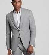 Classic tailoring gets a modern update with this muted gray sport coat from Theory.