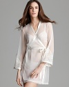 Your awakenings might be even sweeter than your dreams in this sheer cream robe with lace.